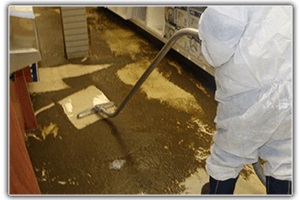 Technician cleaning up sewage
